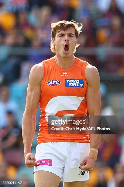 Aaron Cadman of the Giants celebrates a goal during the round 14 AFL match between Brisbane Lions and Greater Western Sydney Giants at The Gabba, on...