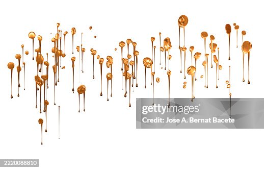 Splashes and drops of liquid gold drip and slide across a white background. Splashes and drops of liquid gold drip and slide across a white background.