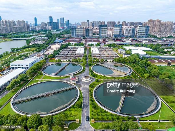 aerial view of sewage treatment plant - city waterworks stock pictures, royalty-free photos & images