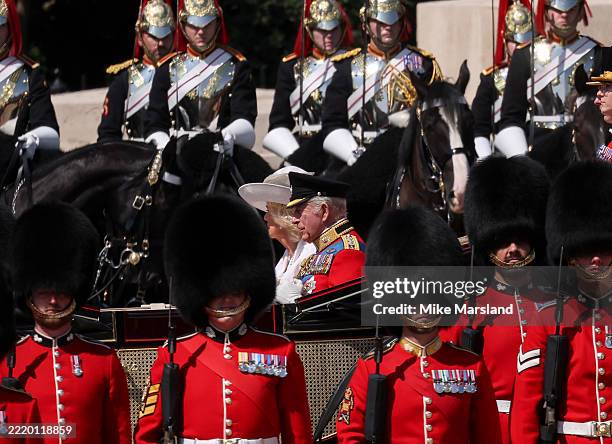 King Charles III and Queen Camilla during Trooping The Colour 2025 on June 14, 2025 in London, England. Trooping The Colour is a ceremonial parade...