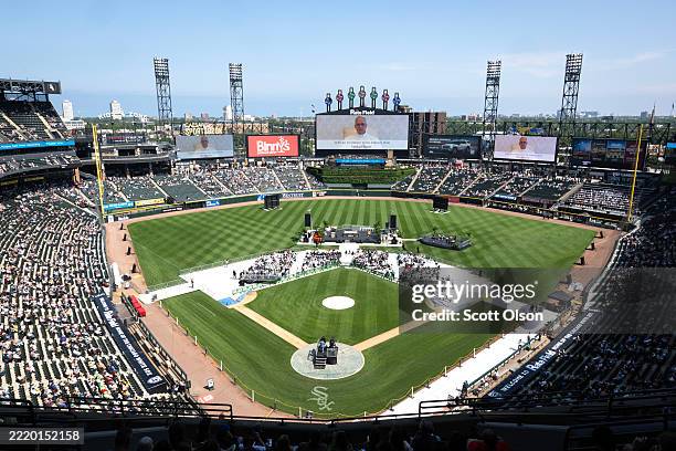 Pope Leo XIV addresses Catholic faithful on the scoreboard at Rate Field, home to the Chicago White Sox, during a celebration and mass to honor his...