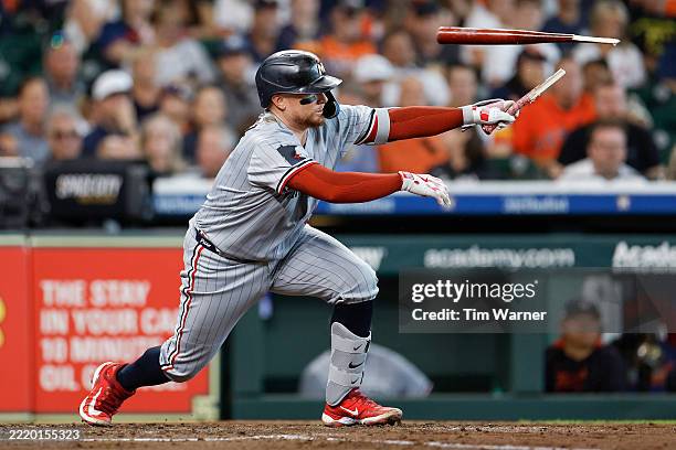 Christian Vazquez of the Minnesota Twins breaks his bat while grounding out in the fifth inning against the Houston Astros at Daikin Park on June 14,...
