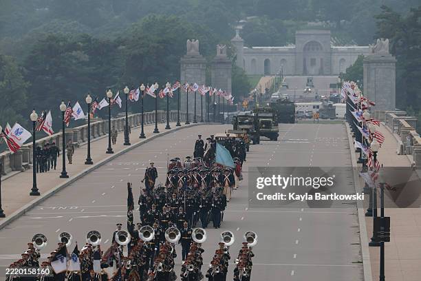 Members of the U.S Army cross Arlington Memorial Bridge to start the parade down Constitution Avenue marking the 250th birthday of the U.S. Army June...