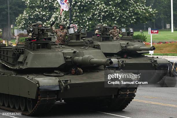 Members of the U.S. Army drive M1A2 Abrams Main Battle tanks in the 250th birthday parade on June 14, 2025 in Washington, DC. The U.S. Army is...