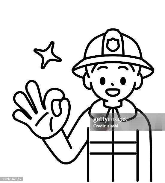 ein junger feuerwehrmann, lächelnd und mit einem ok-handzeichen gestikulierend, schaut den betrachter direkt an und vermittelt "kein problem, reibungsloser ablauf". das bild zeigt einen schwarzen umriss mit flachen farben in einem minimalistischen stil - feuerwehrhelm stock-grafiken, -clipart, -cartoons und -symbole