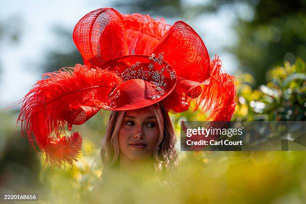 Woman poses for photographs as she arrives at Ascot Racecourse on June 19, 2025 in Ascot, England. Ladies Day at Royal Ascot is traditionally where...