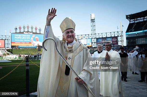 Cardinal Blasé Cupich, Archbishop of Chicago, waves to guests following a mass at Rate Field, home to the Chicago White Sox, to celebrate the...