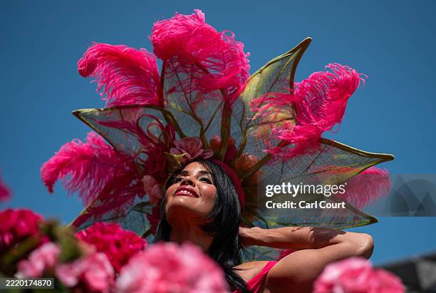 Woman poses for photographs at Ascot Racecourse on June 19, 2025 in Ascot, England. Ladies Day at Royal Ascot is traditionally where the focus is on...