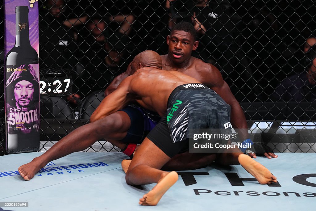 Usman Rgh Kamaru Usman of Nigeria takes down Joaquin Buckley in a welterweight ...