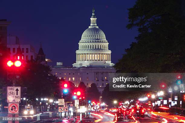 In a long exposure photo, the U.S. Capitol Building is seen at dusk as vehicles travel on Pennsylvania Avenue on June 18, 2025 in Washington, DC.