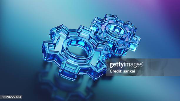 abstrakte zahnräder aus blauem glas, die technologie- und innovationskonzepte repräsentieren - verzahnt stock-fotos und bilder