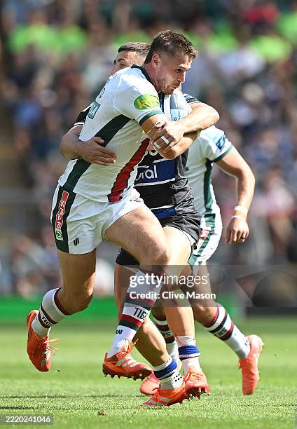 Freddie Steward of Leicester Tigers is tackled by Cameron Redpath during the Gallagher Premiership Rugby Final match between Bath Rugby and Leicester...