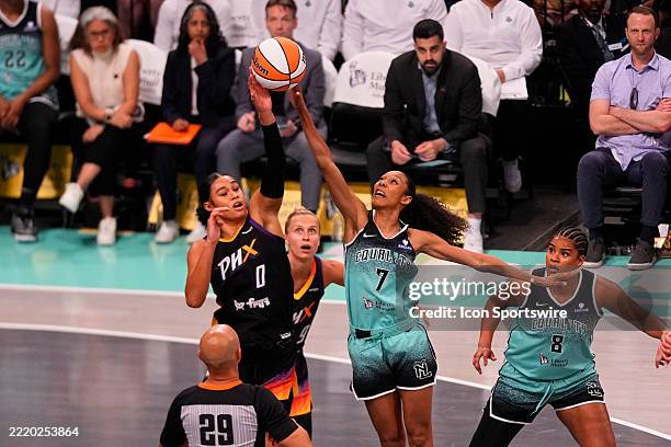 Phoenix Mercury Forward Satou Sabally wins the tip off against New York Liberty Guard Rebekah Gardner during the first half of the Women National...