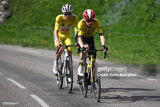 Tadej Pogacar of Slovenia and UAE Team Emirates - XRG - Yellow leader jersey and Jonas Vingegaard of Denmark and Team Visma | Lease a Bike compete in...
