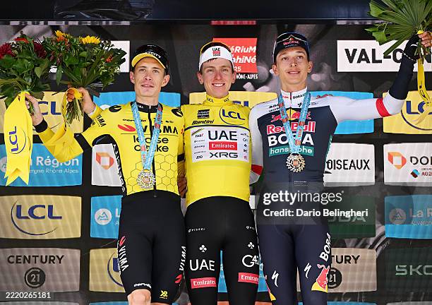 Jonas Vingegaard of Denmark and Team Visma | Lease a Bike on second place, race winner Tadej Pogacar of Slovenia and UAE Team Emirates - XRG - Yellow...