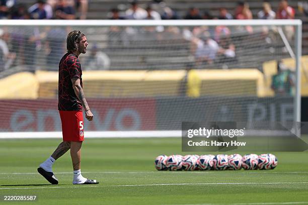 Rodrigo De Paul of Atletico De Madrid inspects the pitch prior to the FIFA Club World Cup 2025 group B match between Paris Saint-Germain FC and Club...