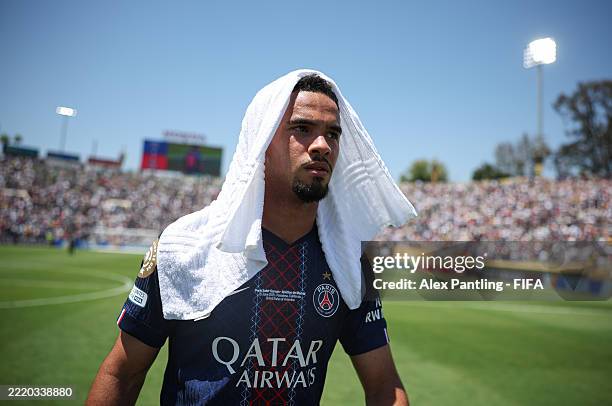 Warren Zaire-Emery of Paris Saint-Germain covers himself in a towel due to the heat after the FIFA Club World Cup 2025 group B match between Paris...