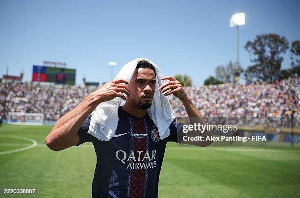 Warren Zaire-Emery of Paris Saint-Germain covers himself in a towel due to the heat after the FIFA Club World Cup 2025 group B match between Paris...