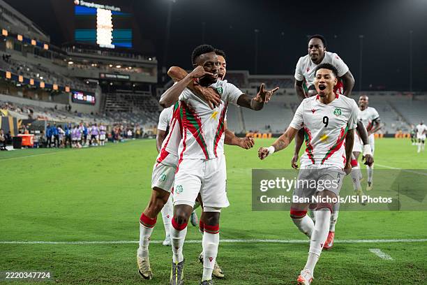 Shaquille Pinas of Suriname celebrates with his teammates after converting a penalty against Costa Rica in the Gold Cup at Snapdragon Stadium on June...