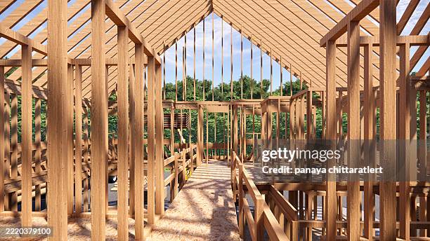 rendu 3d maison en bois . équipe de construction mettant en place la charpente de la nouvelle maison.modèle architectural sur le chantier de construction de la maison. - menuiserie photos et images de collection