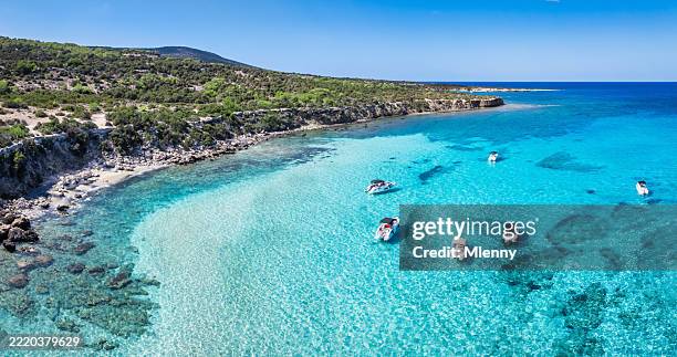 blue lagoon cyprus drone view with white anchored boats akamas peninsula - mlenny stock pictures, royalty-free photos & images