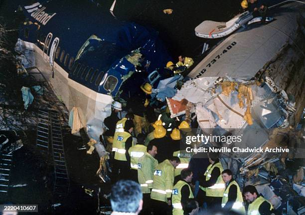 The emergency services attending the scene where British Midland Flight 092, a Boeing 737-400, crashed onto the M1 on the approach to East Midlands...