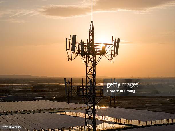 5g sunset cell tower: cellular communications tower for mobile phone and video data transmission - mobile phone base station stock pictures, royalty-free photos & images