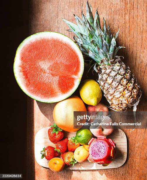top down image of colourful, ripe fruits - dragon fruit stock pictures, royalty-free photos & images