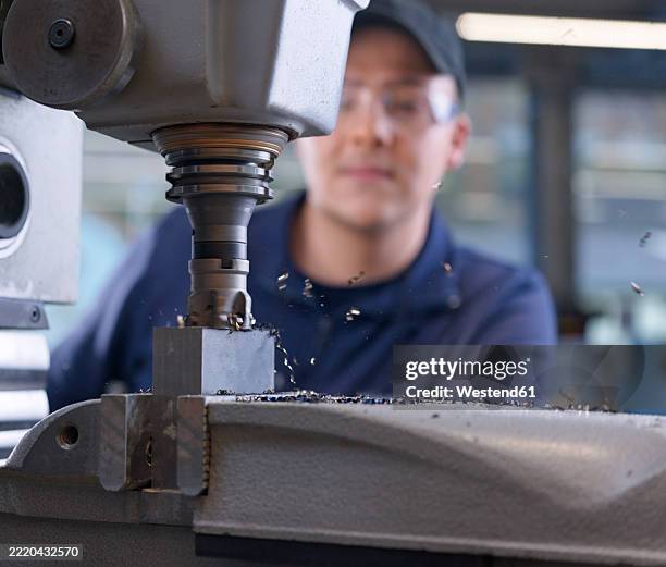 engineer working with metal machine at factory - milling machine stock pictures, royalty-free photos & images