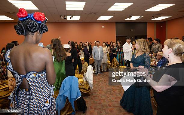 Fely Tchaco greets guests attending the African Arts Academy Presents SF MODEFA 2025 at Saint Mary's Cathedral the on June 15, 2025 in San Francisco,...