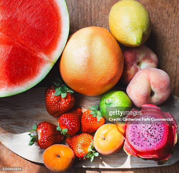 top down image of colourful, ripe fruits - dragon fruit stock pictures, royalty-free photos & images
