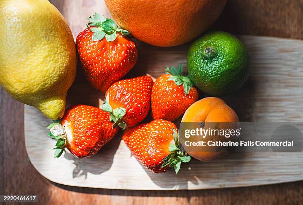 top down image of colourful, ripe fruits - dragon fruit stock pictures, royalty-free photos & images