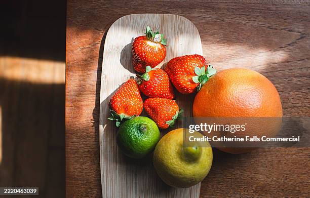 top down image of colourful, ripe fruits - dragon fruit stock pictures, royalty-free photos & images
