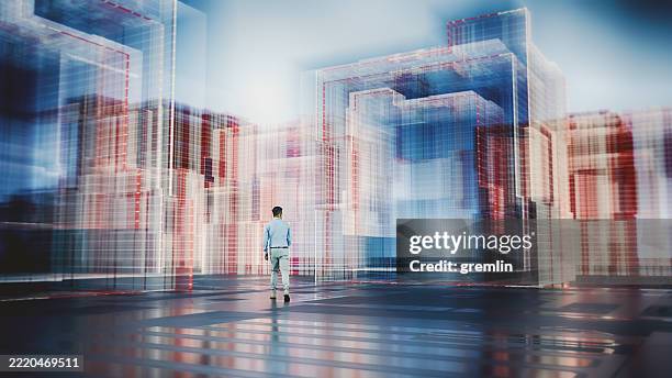 businessman walking in futuristic corridor - complexity stock pictures, royalty-free photos & images