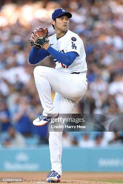 Shohei Ohtani of the Los Angeles Dodgers throws a pitch during the first inning against the San Diego Padres at Dodger Stadium on June 16, 2025 in...
