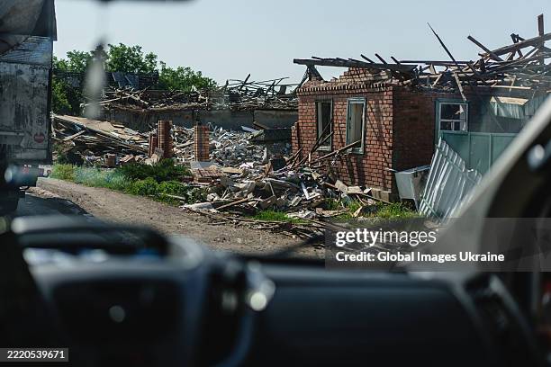 Ruins line the streets of the frontline city of Druzhkivka, as seen from the East SOS evacuation car while driving on a mission in Kostyantynivka on...