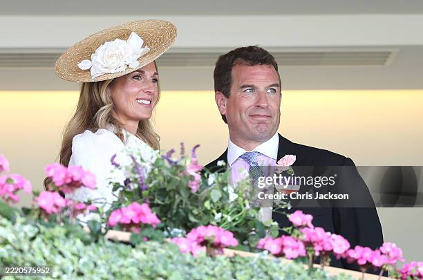 Harriet Sperling and Peter Phillips smile as they attend day one of Royal Ascot at Ascot Racecourse on June 17, 2025 in Ascot, England.