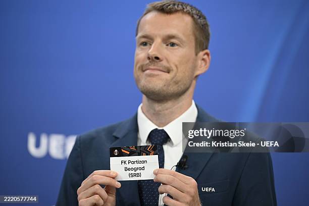 Calendar & Regulations Manager Branco de Kock draws the card of FK Partizan Beograd during the UEFA Europa League 2025/26 First Qualifying Round Draw...