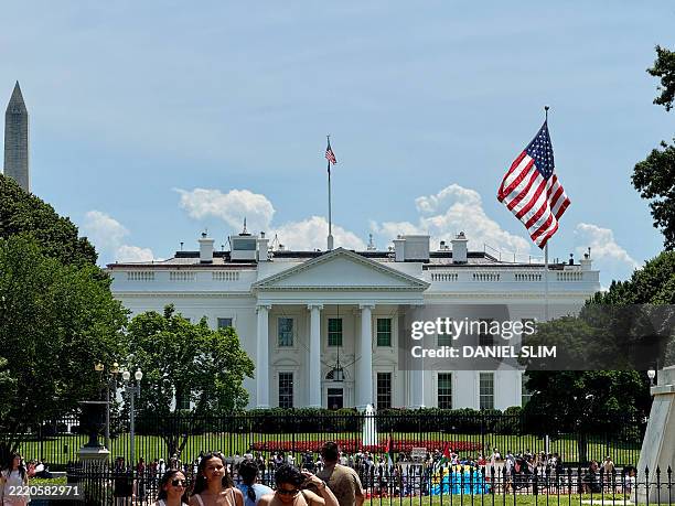Giant US flag flies on a newly-installed flagpole on the North Lawn of the White House in Washington DC, on June 21, 2025.