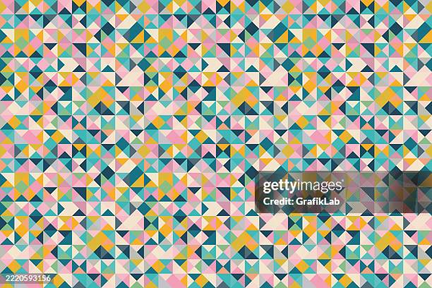 abstract geometric pattern with multicolored triangles and dynamic design - young at heart stock illustrations