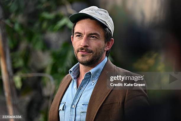 Jonathan Bailey attends the "Jurassic World Rebirth" World Premiere at the Odeon Luxe Leicester Square on June 17, 2025 in London, England.