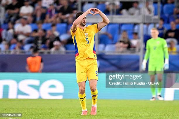 BRATISLAVA, SLOVAKIA Umit Akdag of Romaniacelebrates after scoring their first side goal during the UEFA European Under-21 Championship 2025 Group...