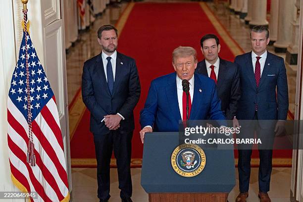 President Donald Trump addresses the nation, alongside US Vice President JD Vance , US Secretary of State Marco Rubio and US Secretary of Defense...