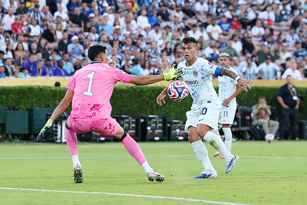 Lautaro Martinez of FC Internazionale Milano scores his team's second goal past Esteban Andrada of CF Monterrey that was later disallowed due to...