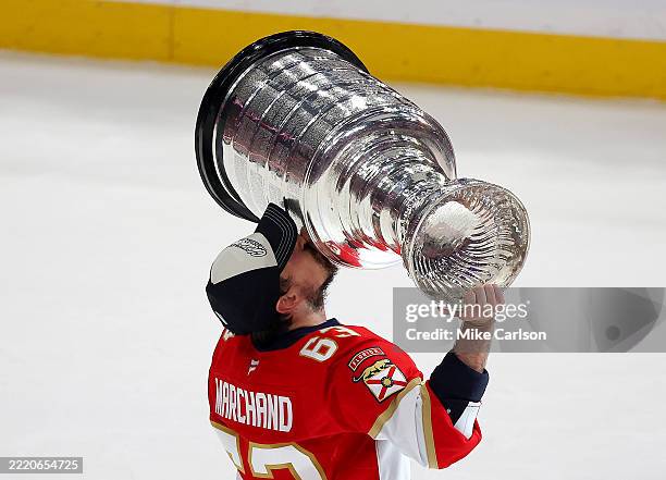 Brad Marchand of the Florida Panthers celebrates with the Stanley Cup after defeating the Edmonton Oilers in Game Six of the 2025 Stanley Cup Final...