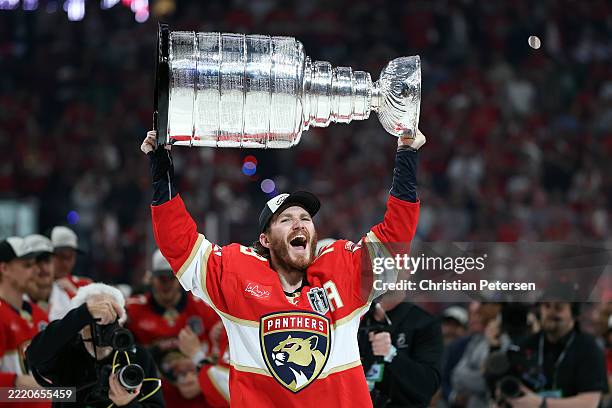 Matthew Tkachuk of the Florida Panthers celebrates with the Stanley Cup after defeating the Edmonton Oilers in Game Six of the 2025 Stanley Cup Final...