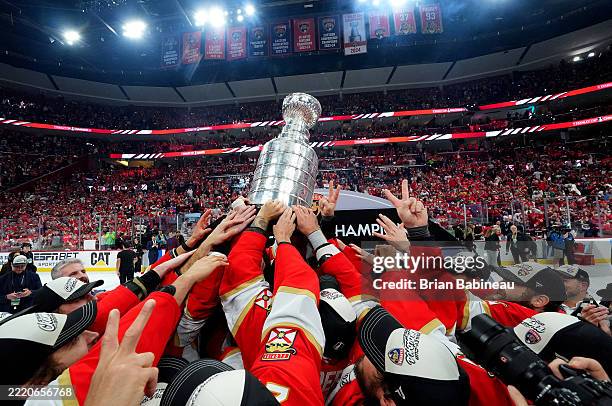 The Florida Panthers celebrate with the Stanley Cup on the ice after Game Six of the 2025 Stanley Cup Final between the Edmonton Oilers and the...