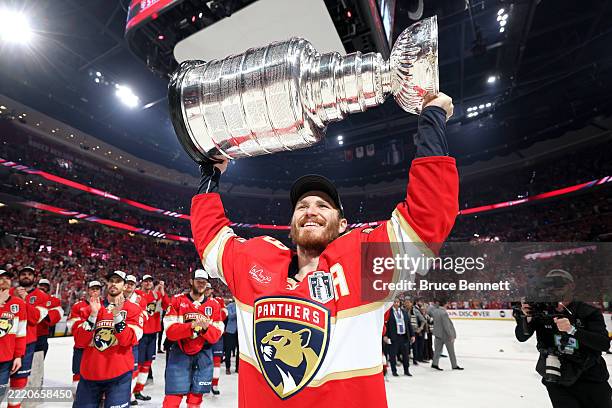 Matthew Tkachuk of the Florida Panthers celebrates with the Stanley Cup after defeating the Edmonton Oilers in Game Six of the 2025 Stanley Cup Final...