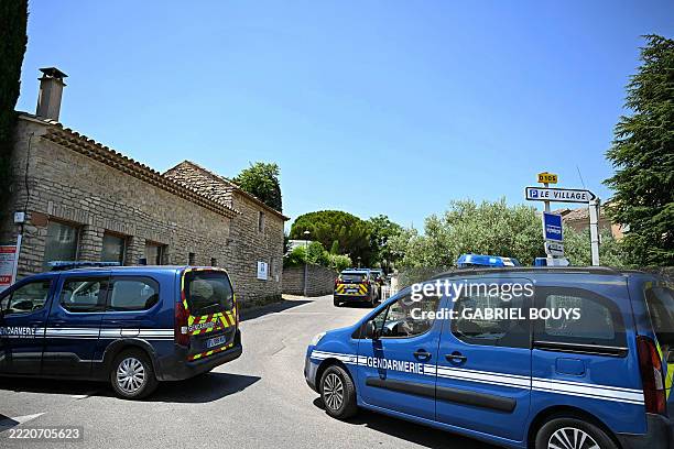French gendarmes secure a perimeter near the site of a fatal shooting during a wedding party in Goult, in the southern French department of Vaucluse,...