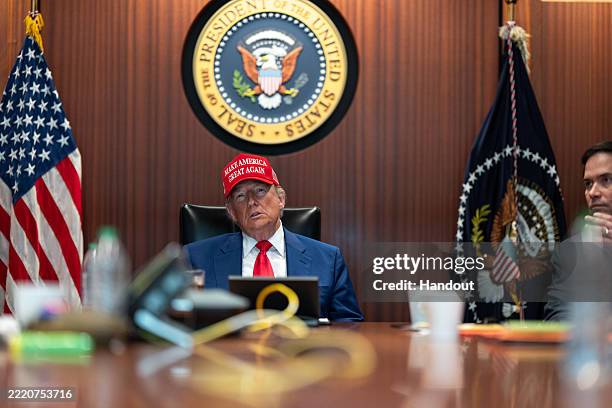 In this handout provided by the White House, U.S. President Donald Trump and Secretary of State Marco Rubio sit in the Situation Room as they monitor...